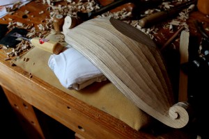 For carving the outer flutes, it took some creative arranging of pegs, holdfasts, even T-shirts.